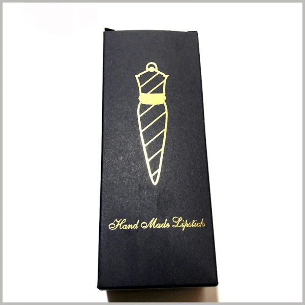Custom black lipstick packaging boxes with bronzing printing.The black product packaging has a gold lipstick style pattern on it.